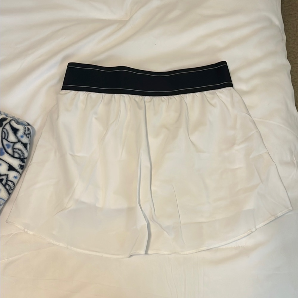 ALO Yoga White Mini Skirt with Black Waistband - Picture 2 of 4